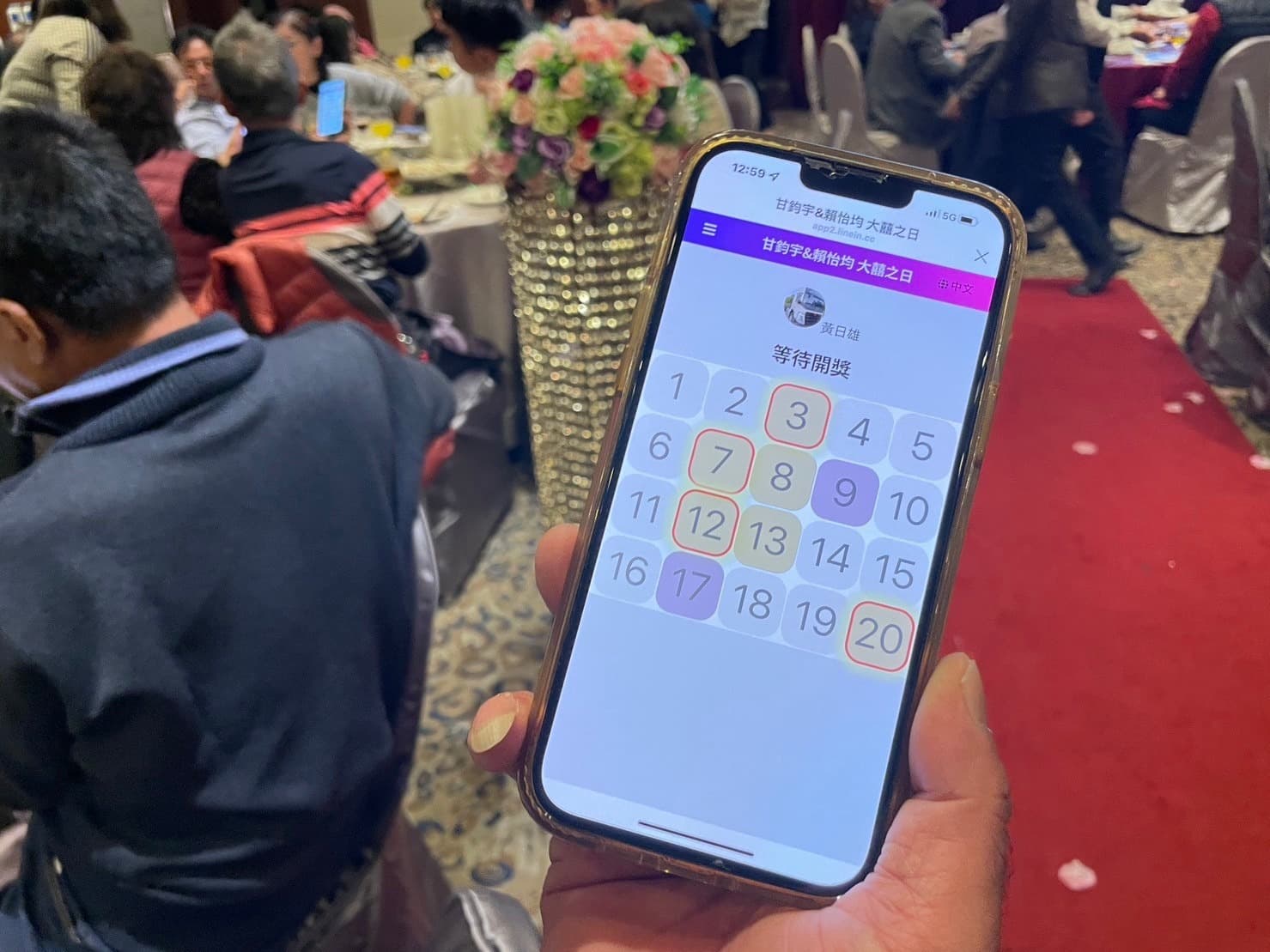 Big screen and phones in sync as the whole room counts down to the draw