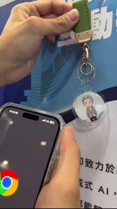 Optional NFC — tap a phone to the keychain and the pre-set page opens