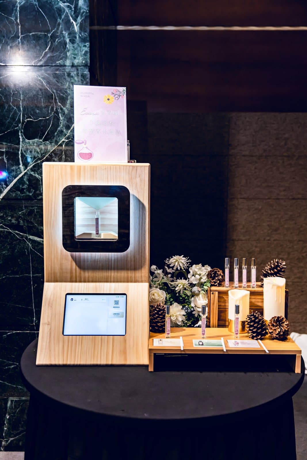 Full view of the wooden Scent Machine with a marble-backed display