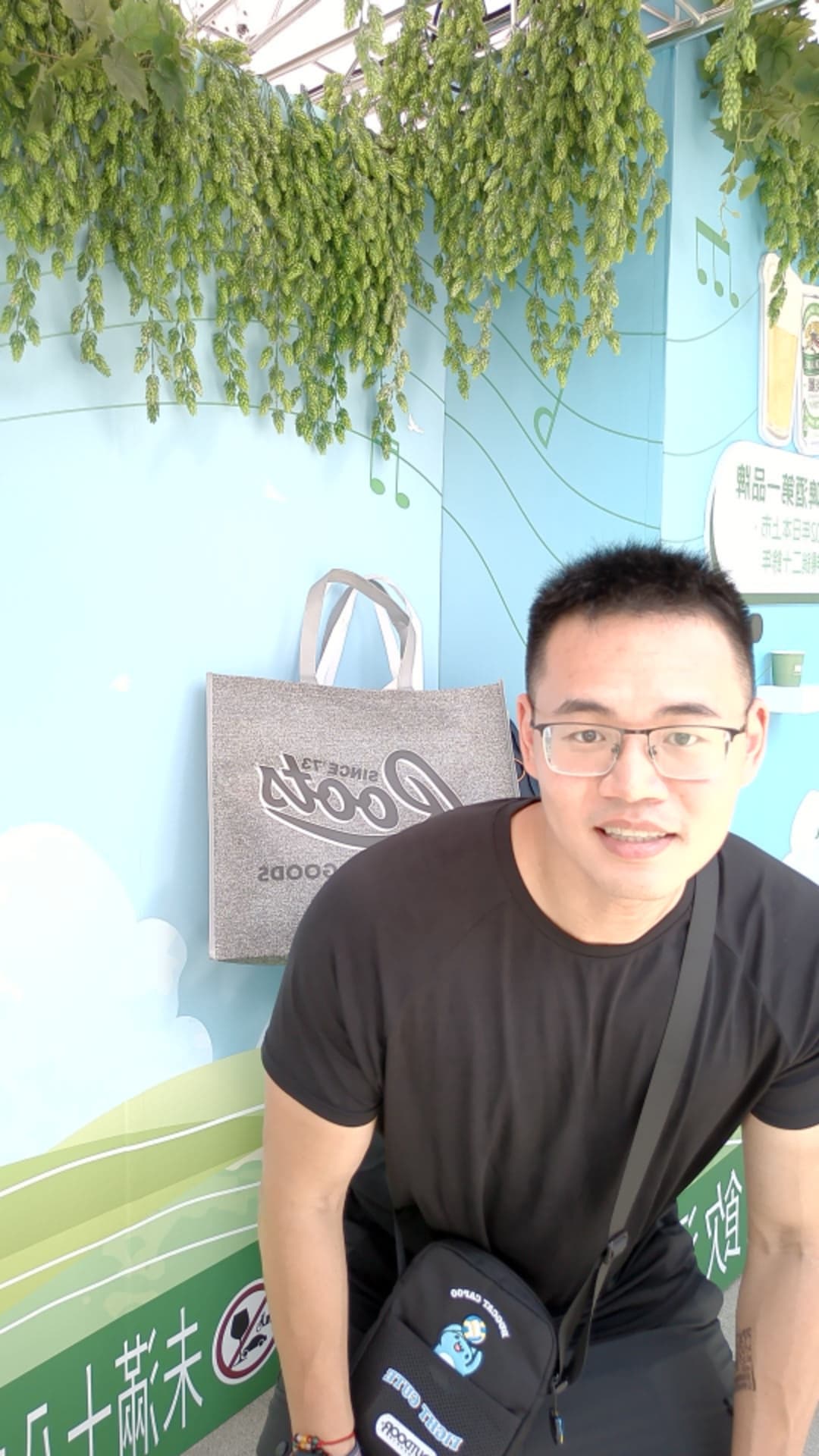 KIRIN pop-up — guest beside the oversized can