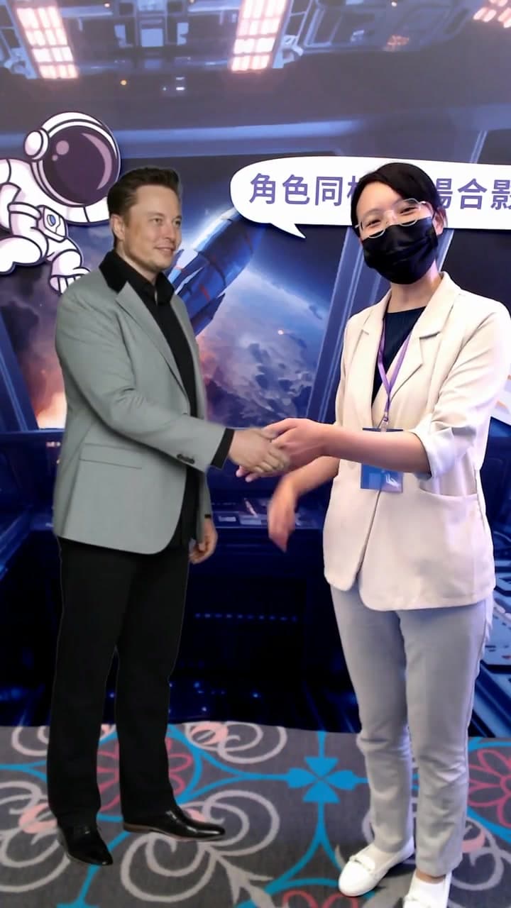 Guest shaking hands with a virtual Elon Musk — the photo output