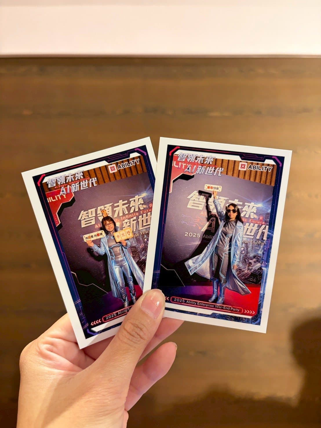 Close-up of two freshly printed AI transformation cards — digital file plus physical keepsake