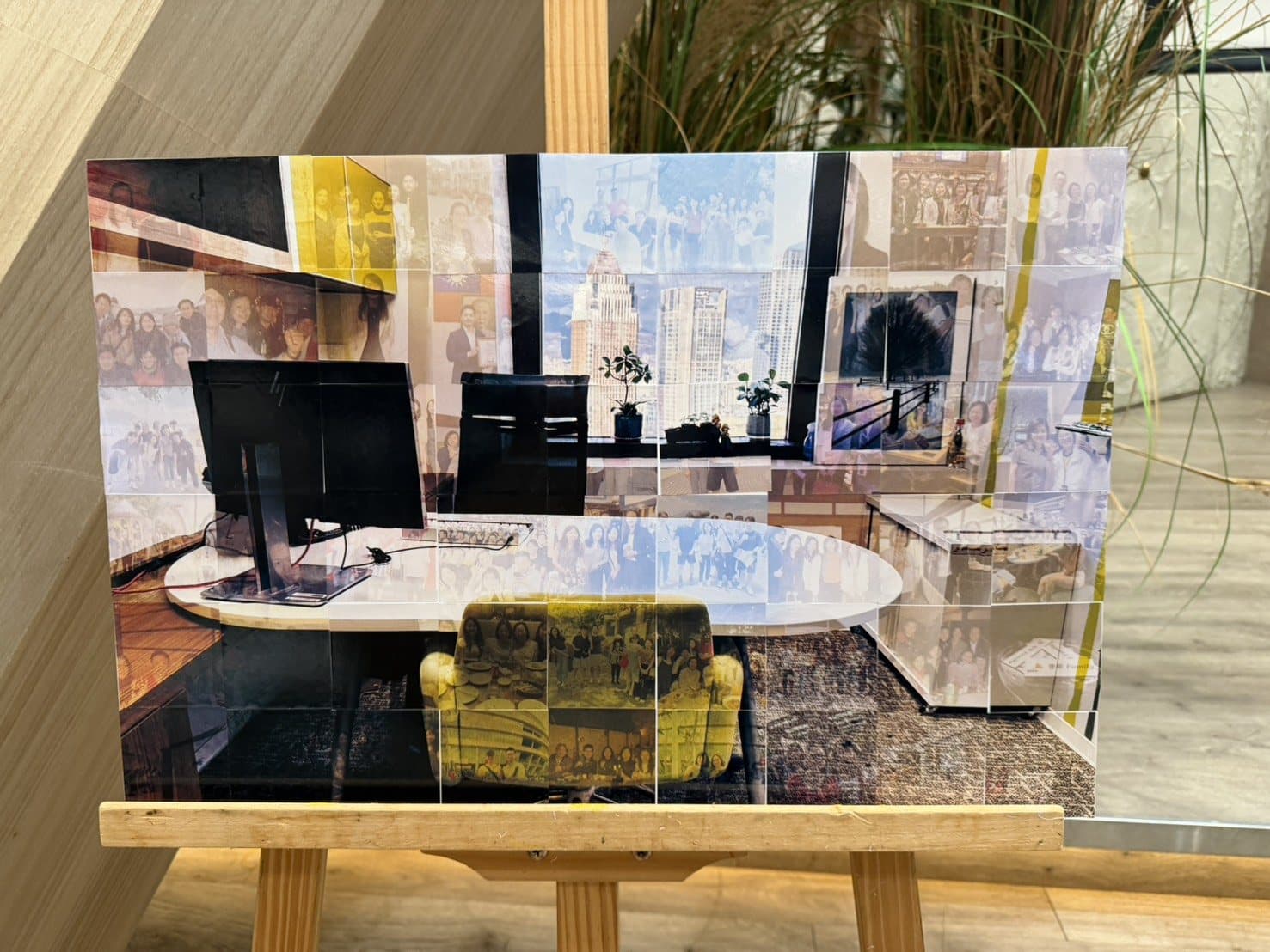 Backstage dual-screen view — uploaded photos tiling into the key visual in real time