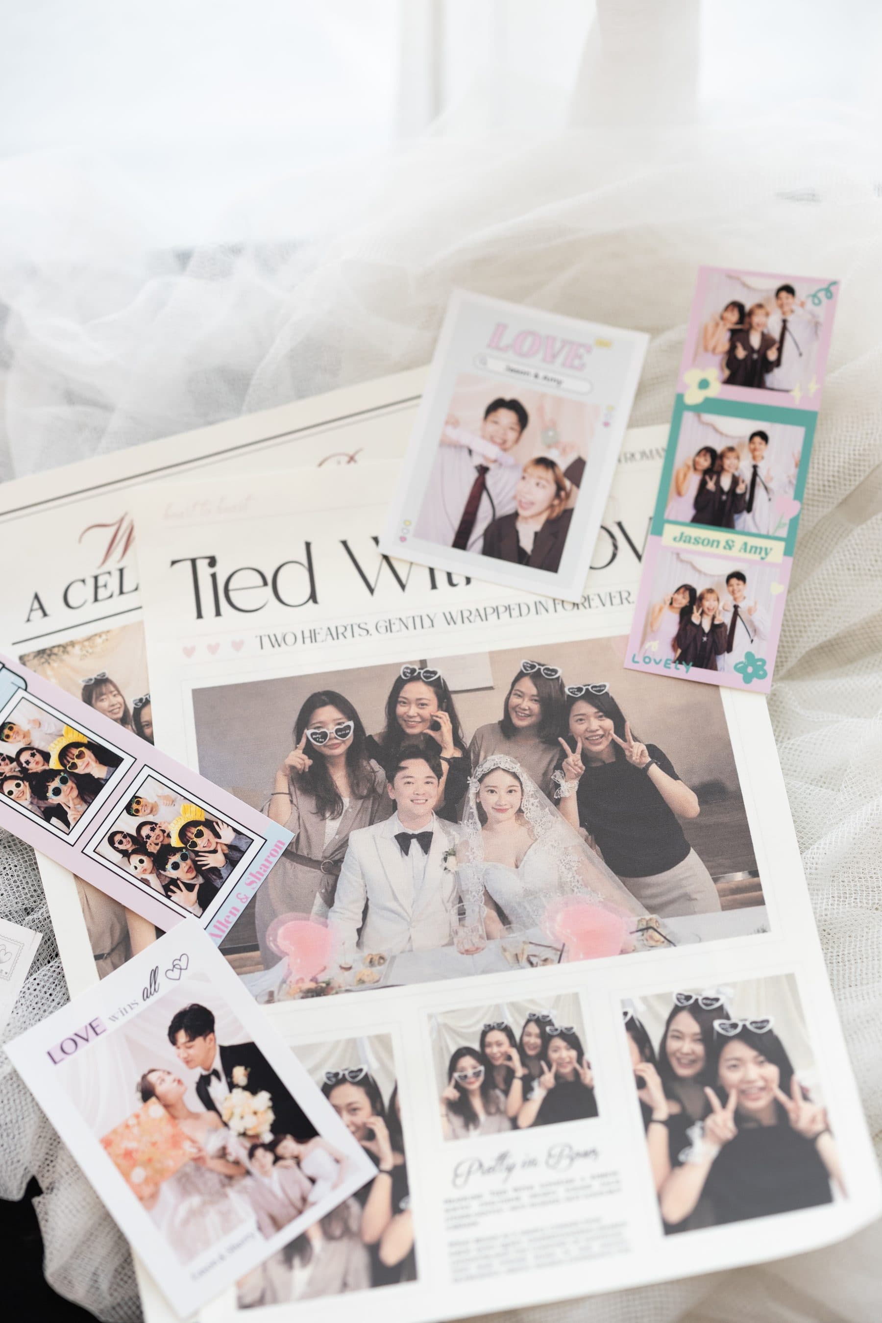 The newspaper flat-laid alongside photo strips
