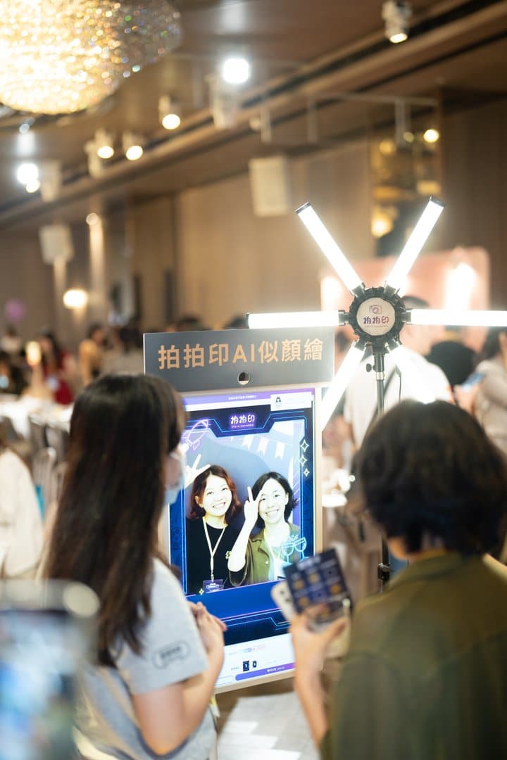 Guests trying the AI portrait booth on site, generating their portrait live