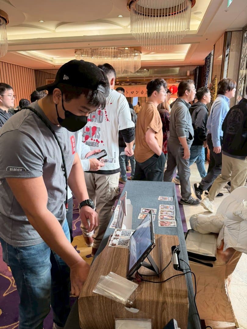 Guests self-checking in by scanning at the check-in desk